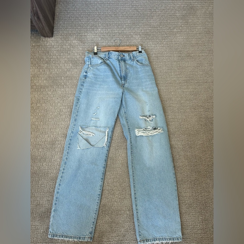 Ripped light wash straight jeans